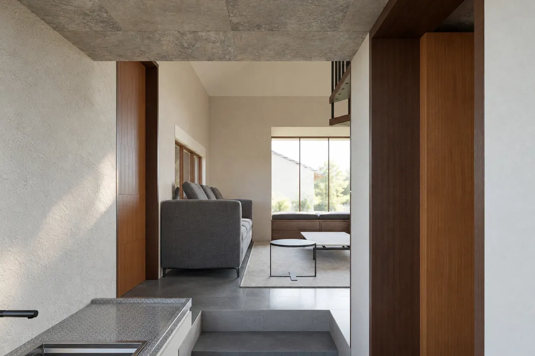 From the kitchen, a step down into the living room