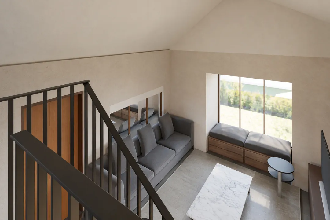 Looking down from the loft into the living room